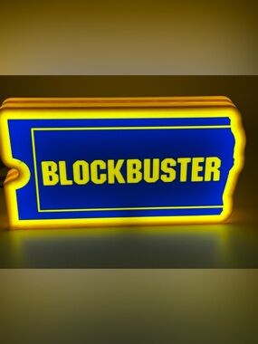 Nostalgia Blue and Yellow Blockbuster Ticket Sign